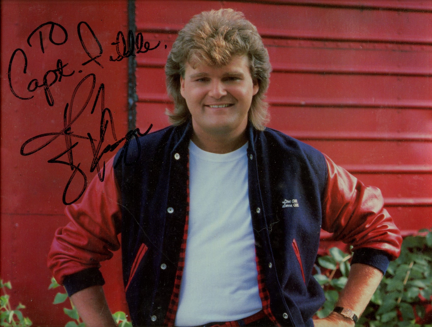 Ricky Skaggs autographs his photo to Captain Fiddle(Ryan Thomson" who opened for him in the Augusta Civic Center, Maine, April 20, 1988