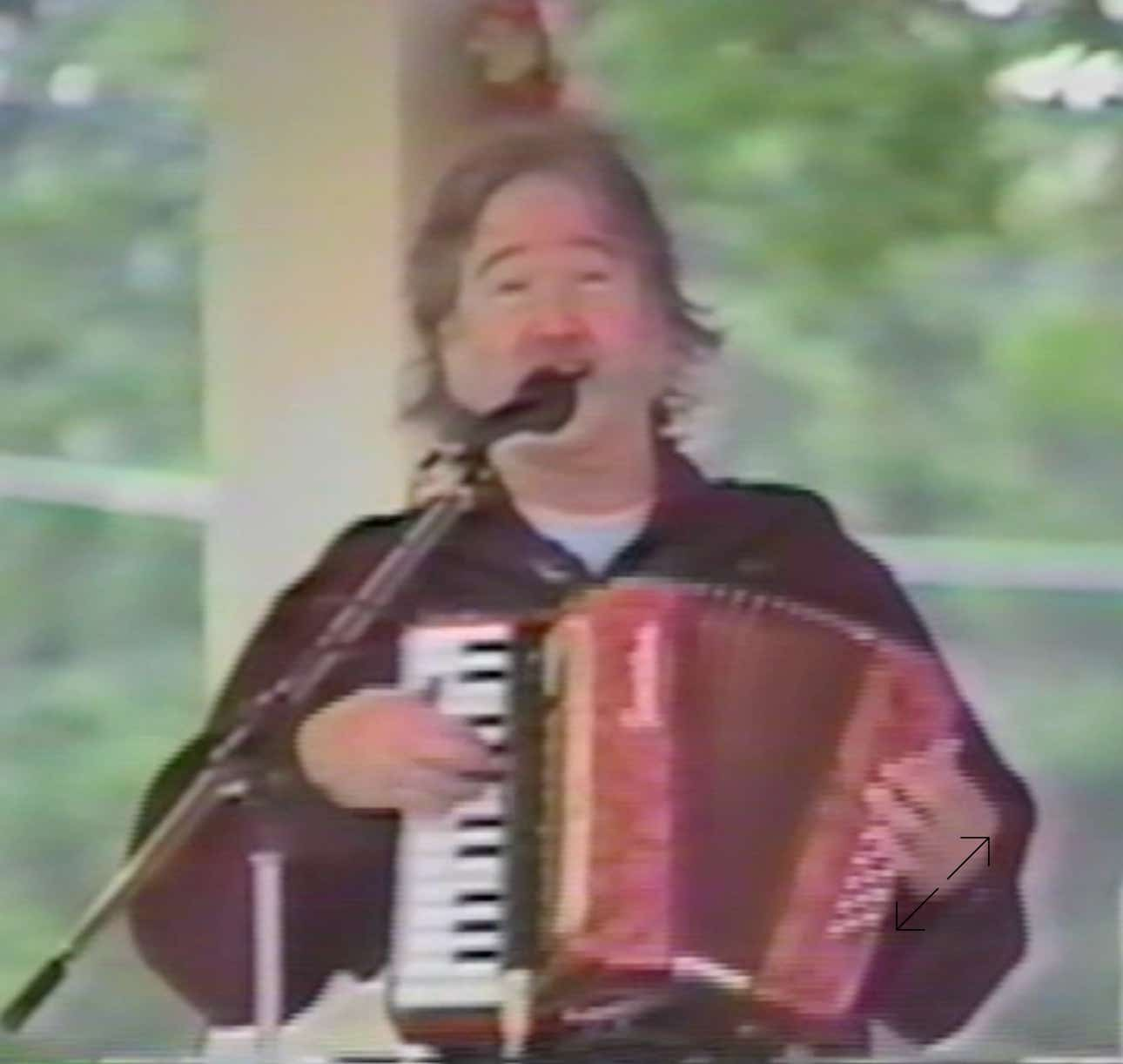 Band leader Ryan Thomson sings and plays accordion at a Crawdad Wranglers concert in Southbridge Massachussetts