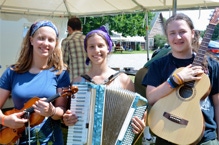 Celia Faux, Stella Faux, and Brennish Thomson, perform at the Appalachian String Band Festival, Clifftop, West Virginia, winning First Place in the Youth Division