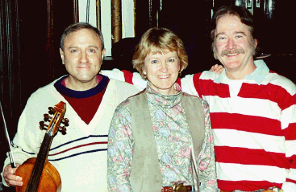 Photo of fiddler Steve Cushing, Damaris Rohsenow, and Ryan Thomson.