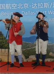 Ryan and Brennish Thomson performing at the American Airlines terminal at the Beijing airport in China