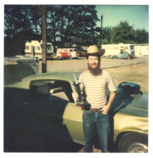 Ryan Thomson in Weiser, Idaho, holding his trophy from the National Fiddle Contest,  The Northeast USA Blaine Stubblefield award